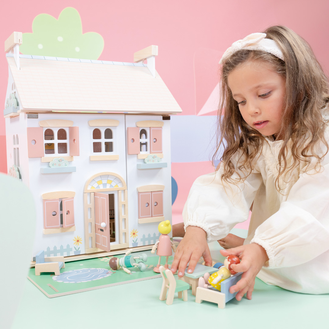 Doll house including furniture